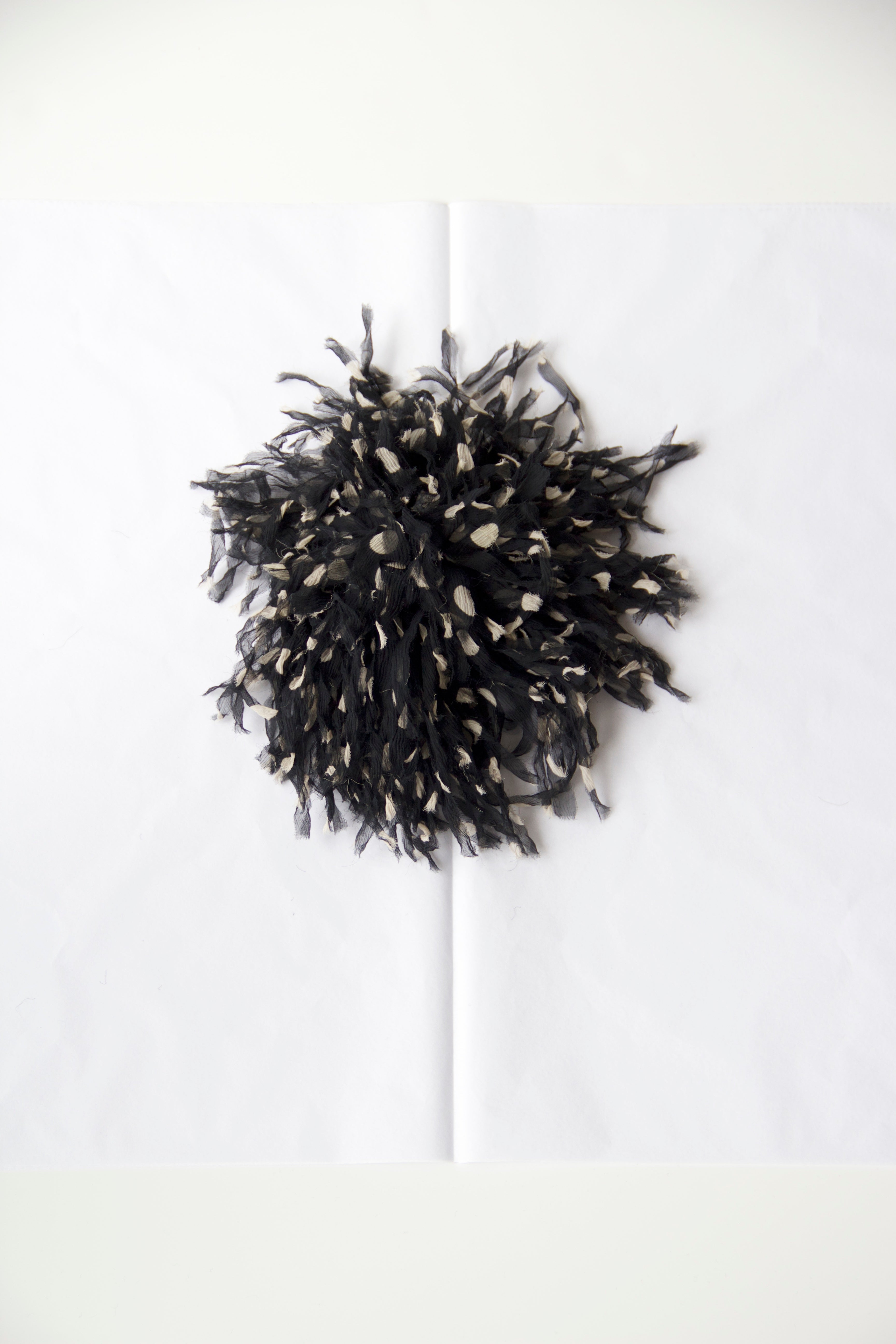 Sea anemone brooch in Black dot silk