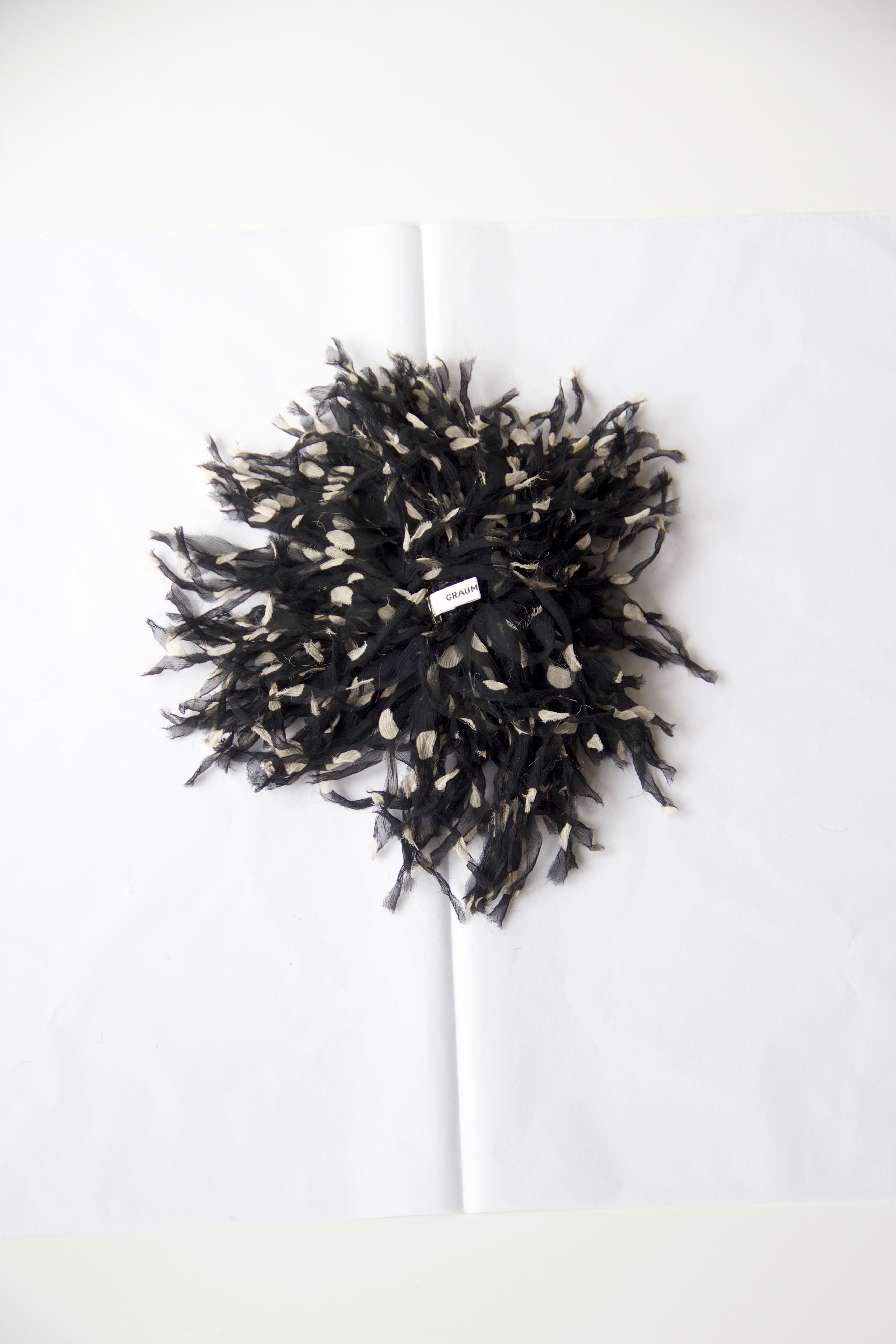 Sea anemone brooch in Black dot silk
